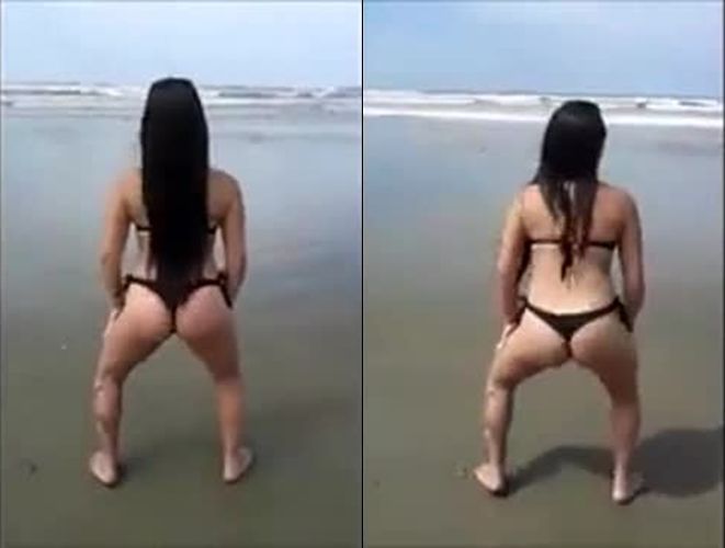 Delicia da mulher dançando funk na praia de biquíni fio dental